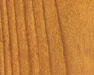 Wood Defender Desert Sand stain shown on cedar